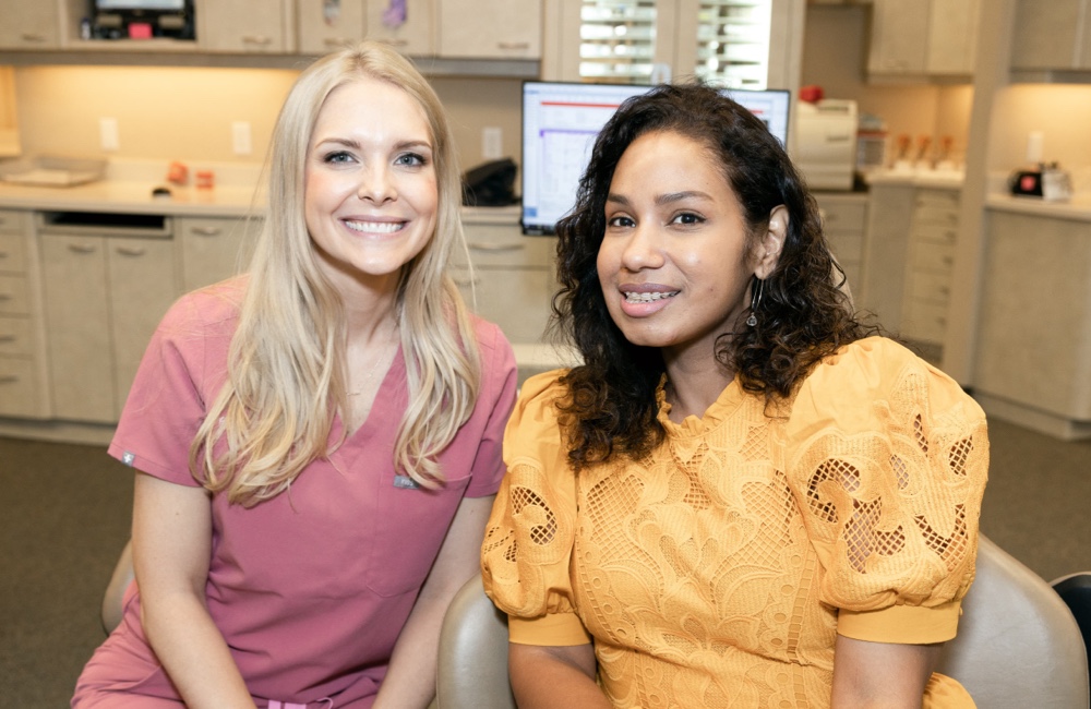 adult patient smiling with dr. borders